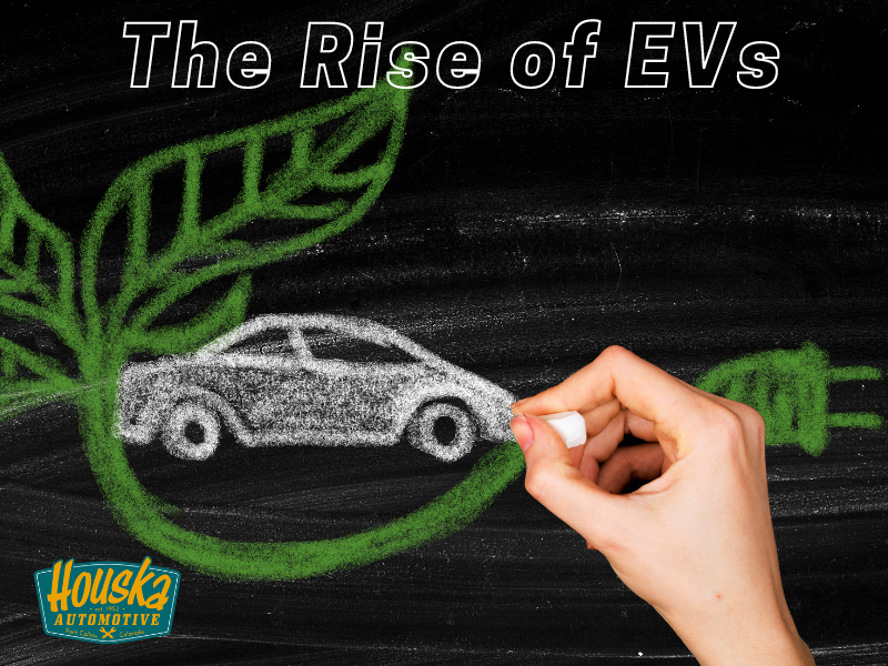 Electric vehicle being drawn on a chalkboard