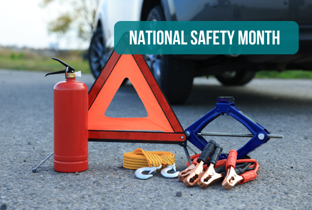 Safety supplies on the ground next to a car and text saying National Safety Month.